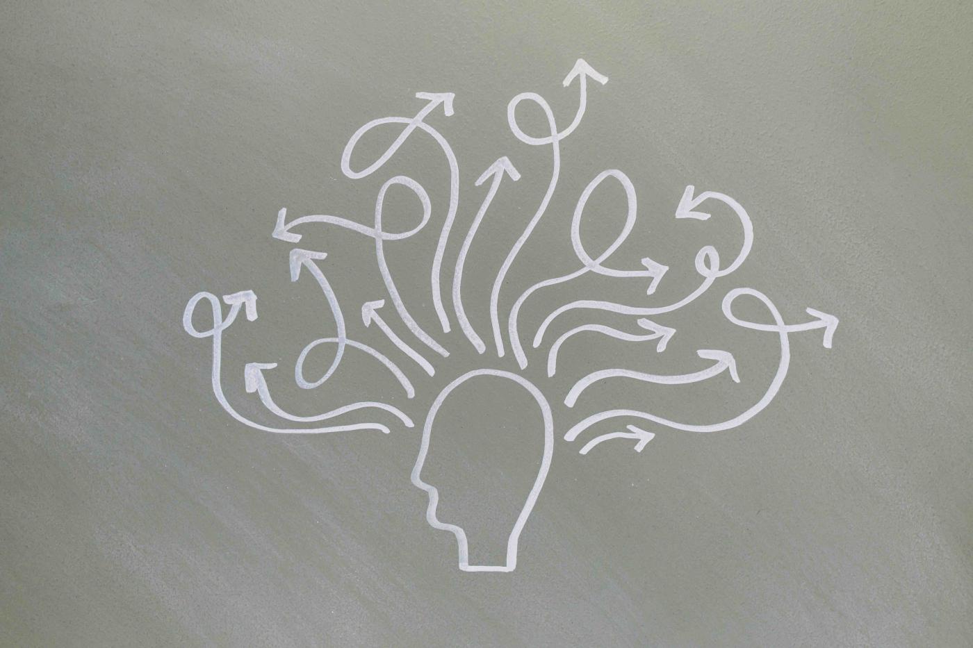 Illustration von einem Kopf mit vielen Linien wegführend